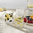 SKEDSTÖR cup set, yellow-black, 30 cl, 2 pack