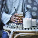 JÄMLIK scented candle in cup, light beige, 20 hr, vanilla